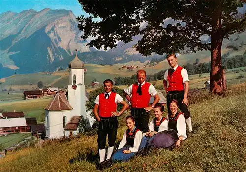 AK / Ansichtskarte  Schoppernau_Vorarlberg Panorama Kirche Trachtengruppe Bregenzerwald Schoppernau Vorarlberg