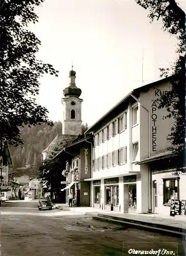 AK / Ansichtskarte  Oberaudorf Kur-Apotheke Blick zur Kirche Oberaudorf