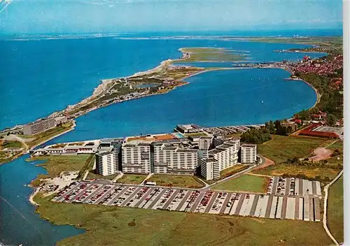 AK / Ansichtskarte  Heiligenhafen_Ostseebad Ferienpark mit Binnensee und Steinwarder Graswarder Fliegeraufnahme Heiligenhafen_Ostseebad