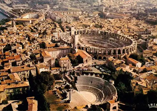 AK / Ansichtskarte  Arles_13 Le theatre Antique et les arenes Vue aerienne 