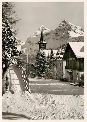 AK / Ansichtskarte  Arosa_GR Dorfkirche mit Furkahoerner Arosa_GR