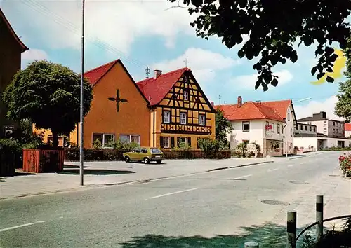 AK / Ansichtskarte 73884511 Neuendettelsau Hauptstrasse mit Loehe Haus und Missionswerk Neuendettelsau