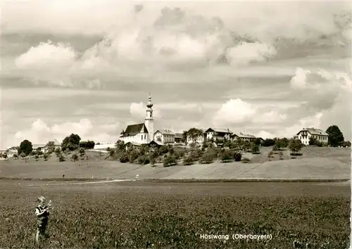 AK / Ansichtskarte 73886370 Hoeslwang Blick ueber die Felder zum Ort Ansicht mit Kirche Hoeslwang