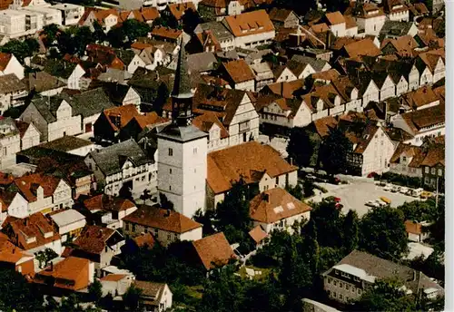 AK / Ansichtskarte 73886402 Burgdorf_Hannover Ortszentrum mit Kirche Burgdorf Hannover