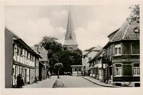 AK / Ansichtskarte  Neustadt_Harz Strassenpartie mit Kirche Neustadt_Harz