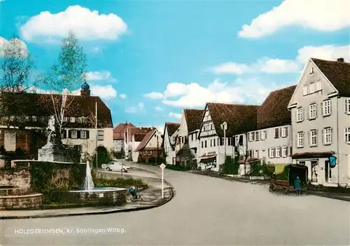 AK / Ansichtskarte  Holzgerlingen Strassenpartie mit Brunnen Holzgerlingen