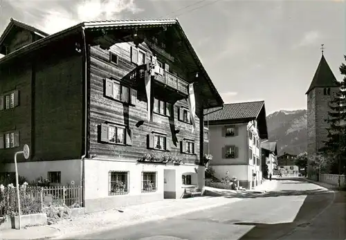AK / Ansichtskarte  Klosters_GR Gasthaus Sonne Dorfstrasse Klosters_GR