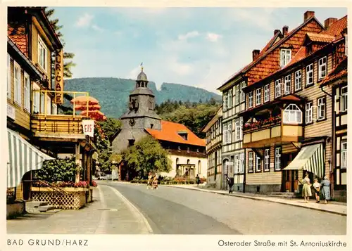 AK / Ansichtskarte  Bad_Grund Osteroder Strasse mit St Antoniuskirche Bad_Grund