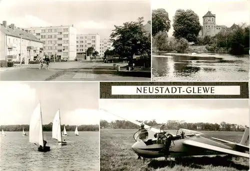 AK / Ansichtskarte  Neustadt-Glewe Strasse des Friedens Burg Am See Segeln GST-Flugplatz Neustadt-Glewe