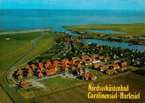 AK / Ansichtskarte 73903914 Carolinensiel-Harlesiel_Ostfriesland Fliegeraufnahme mit Hafen und Feriendorf der DBP