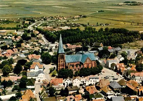 AK / Ansichtskarte 73904199 Meldorf Fliegeraufnahme mit Kirche