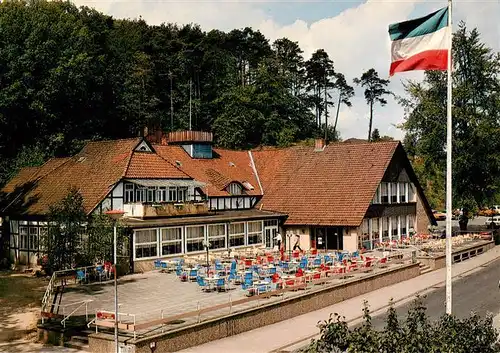 AK / Ansichtskarte 73904742 Hitzacker_Elbe Hotel Restaurant Waldfrieden Terrasse Flagge