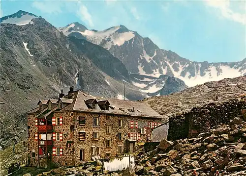 AK / Ansichtskarte  Nuernbergerhuette_2297m_Stubaital_AT mit Feuerstein und Stubaier Alpen