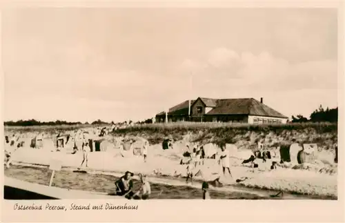 AK / Ansichtskarte 73909728 Prerow_Ostseebad Strand mit Duenenhaus