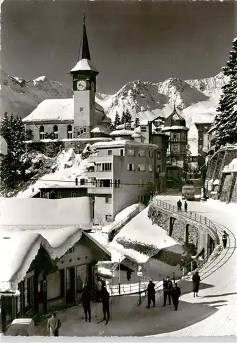 AK / Ansichtskarte  Arosa_GR Ortspartie mit Kirche