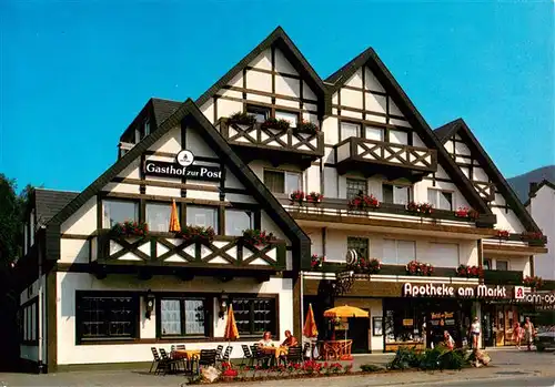 AK / Ansichtskarte 73919646 Olsberg_Sauerland Restaurant Gasthof zur Post Apotheke am Markt