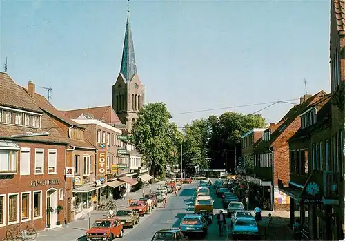 AK / Ansichtskarte 73922303 Friesoythe Strassenpartie Kirche