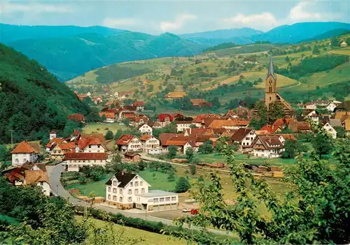 AK / Ansichtskarte 73922334 Oberharmersbach Fliegeraufnahme mit Kirche und Gasthaus Pension Hubertus