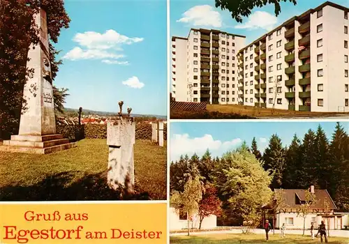 AK / Ansichtskarte 73923517 Egestorf_Deister_Barsinghausen Monument Wohnblocks Park