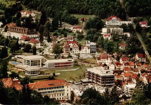 AK / Ansichtskarte  Wildbad_Schwarzwald Thermal Hallen und Freibad Fliegeraufnahme