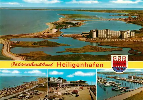 AK / Ansichtskarte  Heiligenhafen_Ostseebad Fliegeraufnahme Strandpartie Hotels Yachthafen