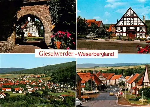 AK / Ansichtskarte 73935078 Gieselwerder Steinernes Tor Fachwerkhaus Panorama Ortsansicht