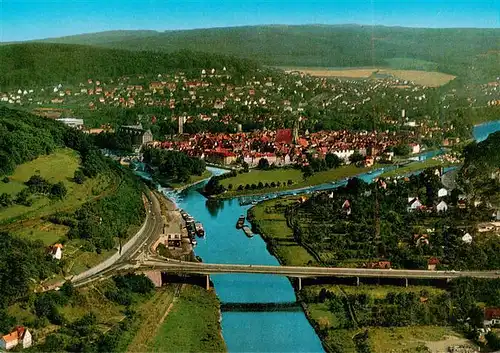 AK / Ansichtskarte  Hann._Muenden Weserbruecke mit Blick auf die Stadt