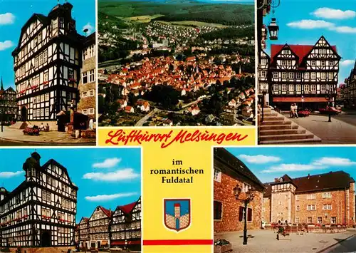 AK / Ansichtskarte 73936695 Melsungen_Fulda Rathaus Panorama Fachwerkhaeuser Schlossplatz