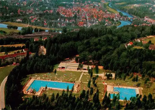 AK / Ansichtskarte 73936701 Melsungen_Fulda Fliegeraufnahme mit Waldschwimmbad