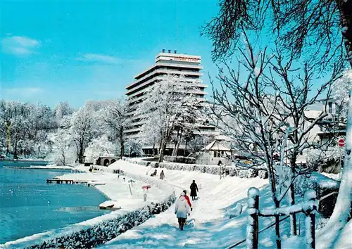 AK / Ansichtskarte 73940346 Malente-Gremsmuehlen Diekseepromenade im Schnee