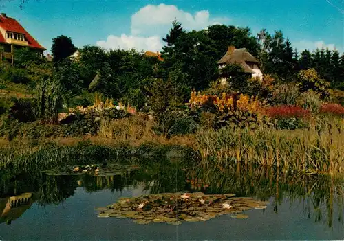 AK / Ansichtskarte 73940357 Malente-Gremsmuehlen Seerosenteich im Kurpark