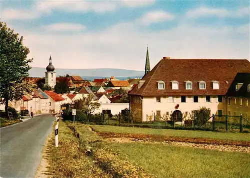 AK / Ansichtskarte 73941278 Konnersreuth_Oberpfalz Ortseinfahrt Blick zur Kirche