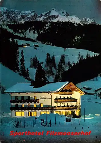 AK / Ansichtskarte 73945515 Filzmoos_AT Sporthotel Filzmooserhof Winterpanorama Nachtaufnahme