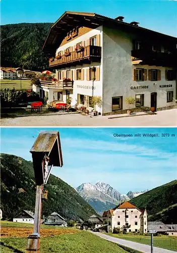 AK / Ansichtskarte 73945516 Oberrasen Gasthof Troger Albergo Kreuz Blick gegen Wildgall Alpen