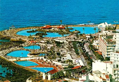 AK / Ansichtskarte 73946715 Puerto-de-la-Cruz_Tenerife_ES Piscinas y lago artificial Hoteles vista aérea