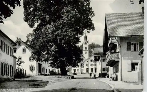 AK / Ansichtskarte 73949194 Bad_Kohlgrub Ortszentrum Blick zur Kirche