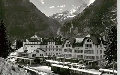 AK / Ansichtskarte  Grindelwald_BE Bahnhof mit Hotels Bahnhof Terminus und Regina