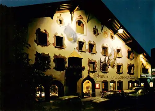 AK / Ansichtskarte 73951020 Kitzbuehel_Tirol_AT Harisch Hotel Goldener Greif Nachtaufnahme