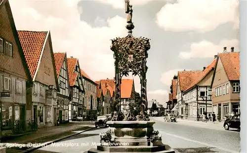 AK / Ansichtskarte 73952043 Springe_Deister Marktplatz mit Marktgrunnen