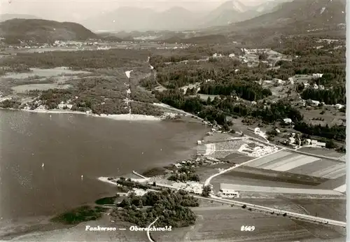 AK / Ansichtskarte 73952522 Faakersee_Kaernten_AT Fliegeraufnahme mit Obereschwald