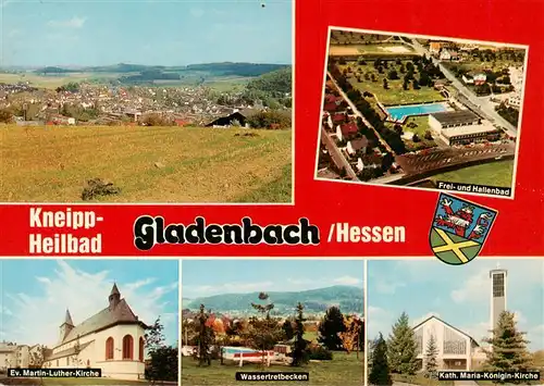 AK / Ansichtskarte 73952725 Gladenbach Panorama Frei und Hallenbad Ev Martin Luther Kirche Wassertretbecken Kath Maria Koenigin Kirche