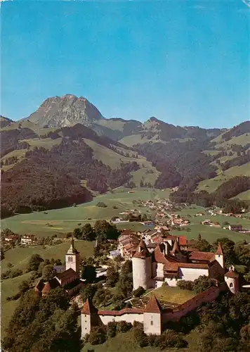 AK / Ansichtskarte  Gruyeres__Gruyere_Greyerz_FR son chateau et le Moleson Vue aerienne