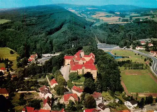 AK / Ansichtskarte  Bad_Iburg Teilansicht mit Schloss Teutoburger Wald