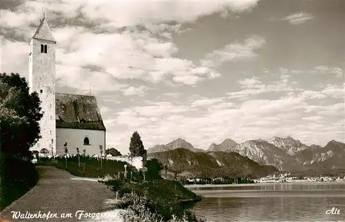 AK / Ansichtskarte  Waltenhofen_Allgaeu_Forggensee_Bayern Partie am See Blick zur Kirche Alpen