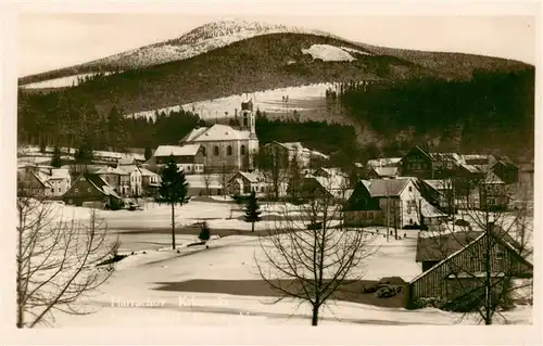 AK / Ansichtskarte 73959677 Harrachov_Harrachsdorf_CZ Ortsansicht mit Kirche Winterlandschaft