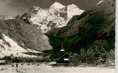 AK / Ansichtskarte  Kandersteg_BE Kath Kirche mit Bluemlisalp