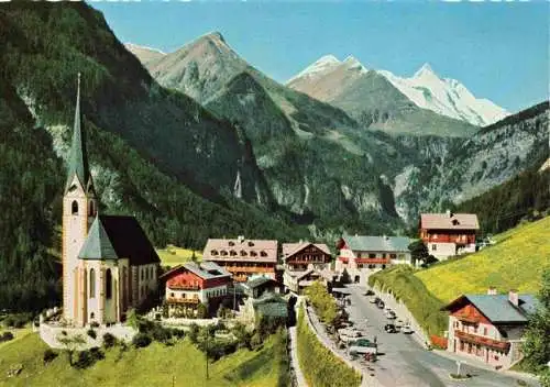 AK / Ansichtskarte 73962733 Heiligenblut_Kaernten_AT Ortsansicht mit Kirche Grossglockner-Alpenstrasse Grossglockner Hohe Tauern