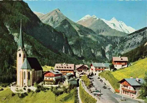 AK / Ansichtskarte  Heiligenblut_Kaernten_AT Ortsansicht mit Kirche Grossglockner-Alpenstrasse Grossglockner Hohe Tauern