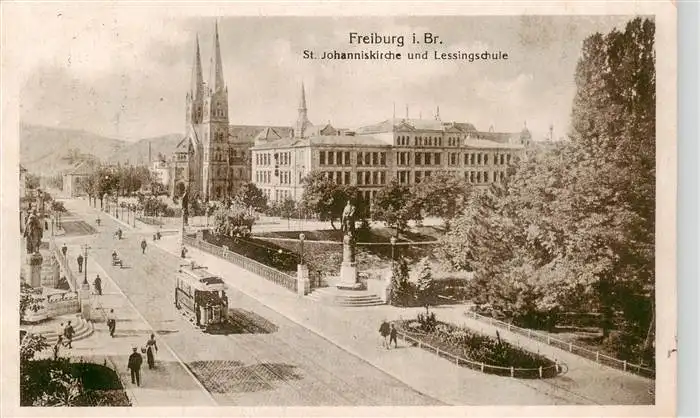 AK / Ansichtskarte 73963538 Strassenbahn_Tramway-- St.Johanniskirche Lessingschule Freiburg i. Br