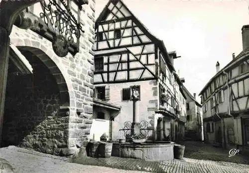 AK / Ansichtskarte  Riquewihr_Haut_Rhin Le Dolder Fontaine et rue des Juin